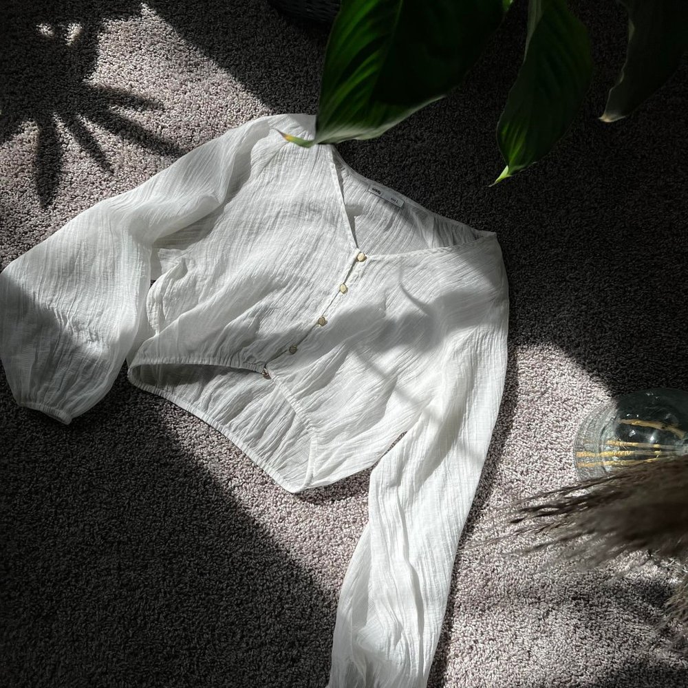 Sheer crop top with pearl buttons